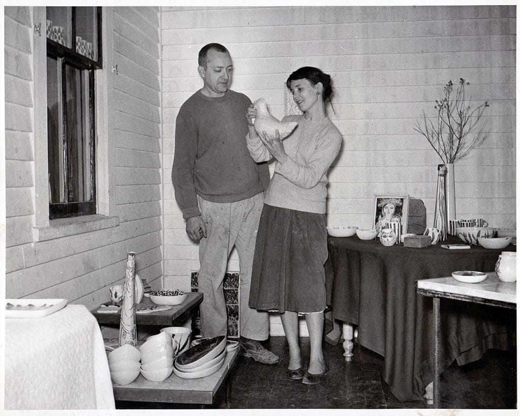 Weston and Brenda holding first rough mold of first wildlife sculpture, the floating gull.